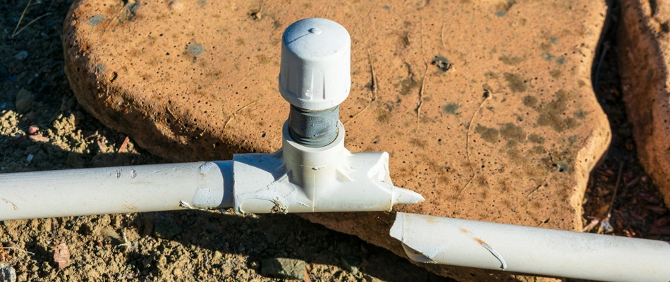 Broken irrigation pipe in a lawn in Lennox, SD.