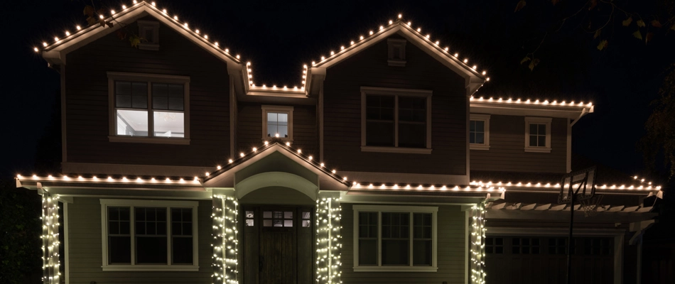 Perimeter of a home with holiday lighting installed in Sioux Falls, SD.