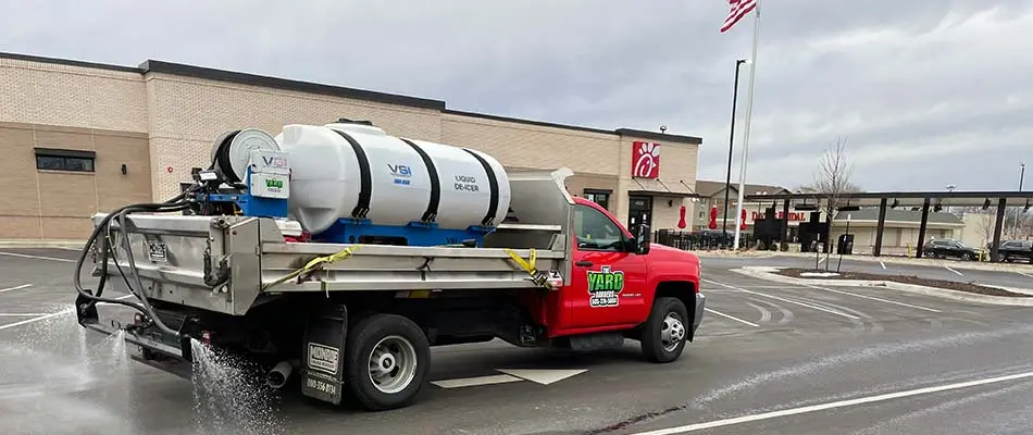 Deicing service truck in a commercial lot near Brandon, SD.